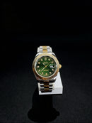 Rolex oyster truetone with green dial